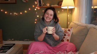 Living-room game night with soft lamps and easy laughter.